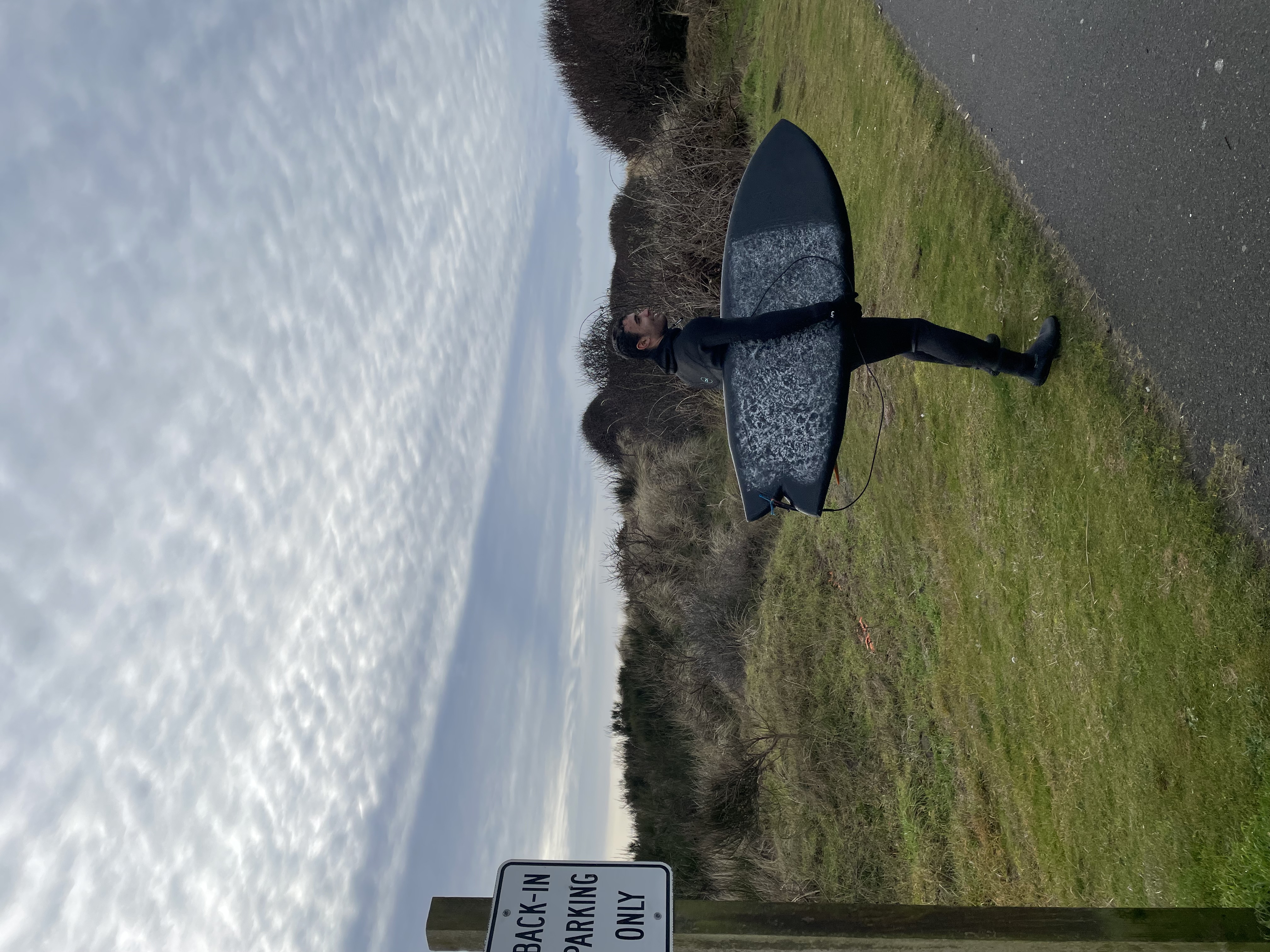 Michael heading out to surf